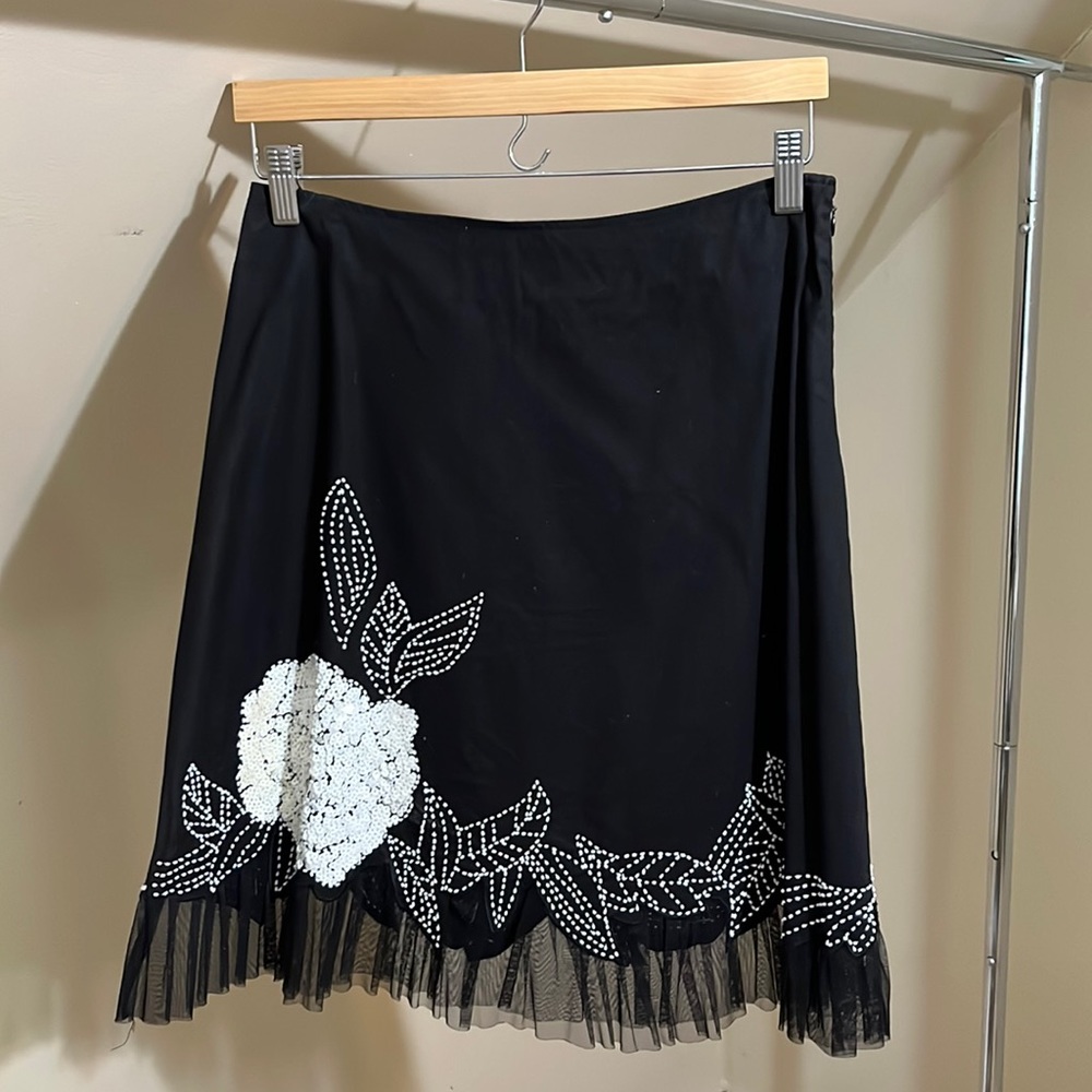 Black skirt with white beadwork and tulle trim